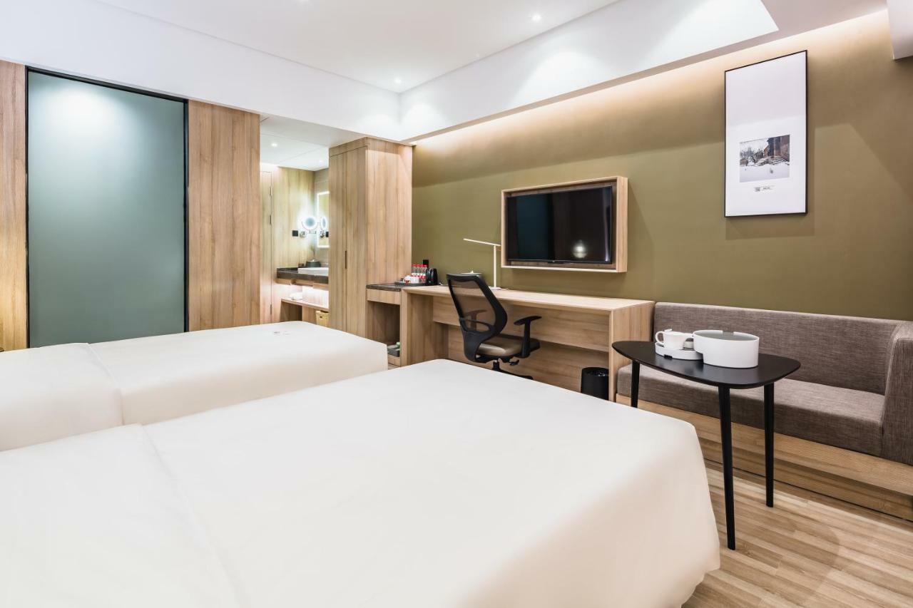 Atour Hotel Цзинань Экстерьер фото